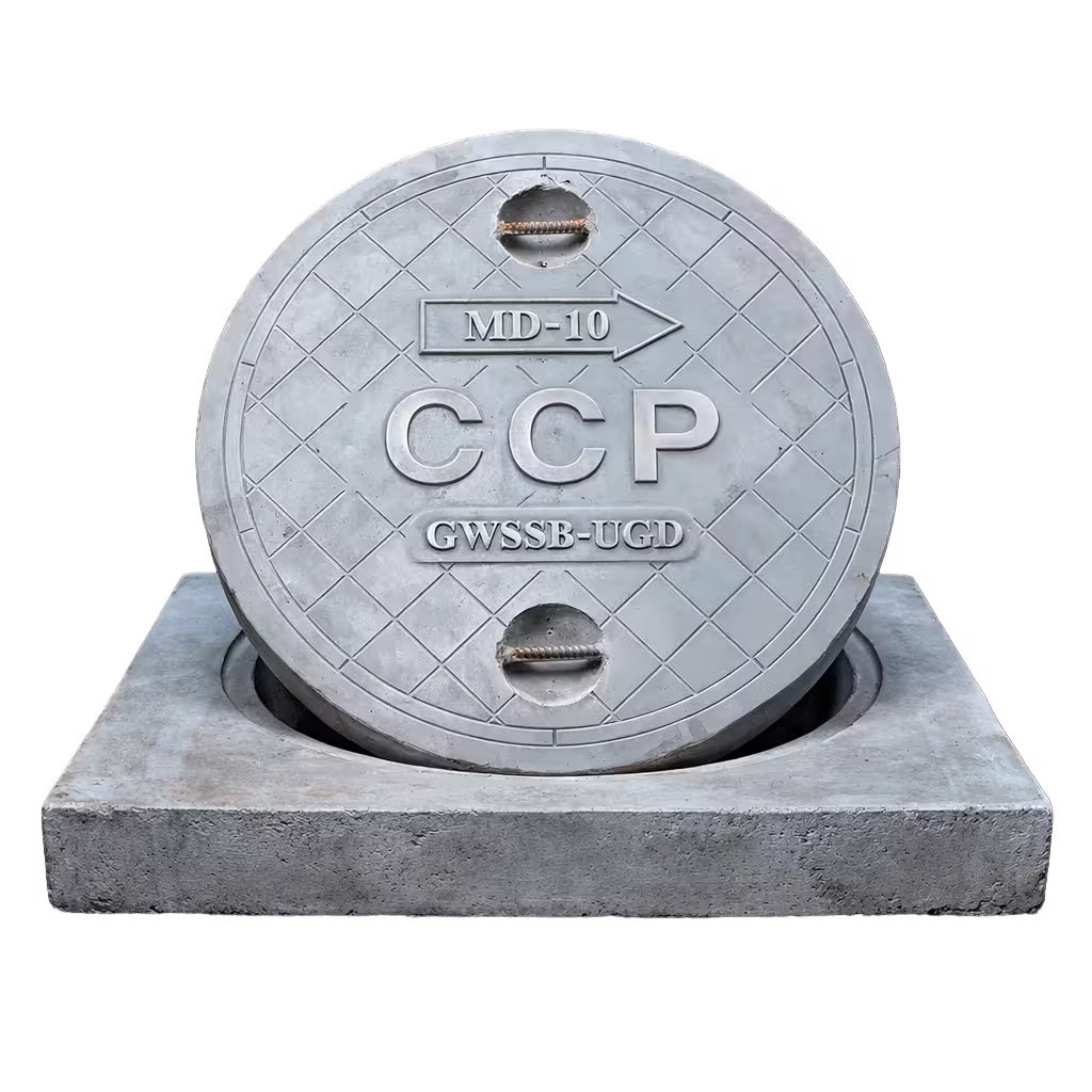 Round RCC manhole cover seated in a square concrete frame